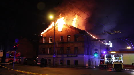 Firemen-Direct-Water-Stream-on-Burning-House