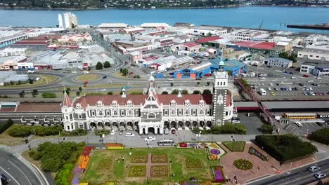 Drone-view-of-the-historic-railway-station-of-Dunedin,-New-Zealand
