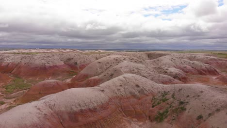Badlands-Landscape-Aerial-with-Storm-Coming-In