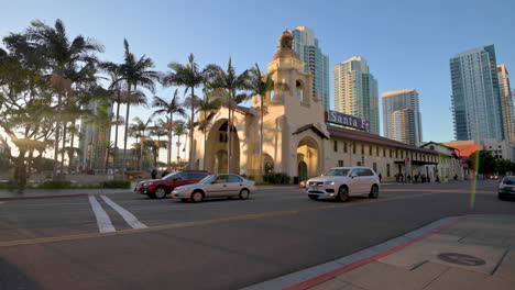 The-busy-streets-by-the-Santa-Fe-train-station-in-San-Diego,-California---wide-pan