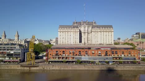 Aerial-of-an-original-warehouse-of-Puerto-Madero-and-Libertador-building-on-background