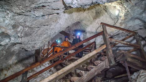 Visitors-Walking-Down-Stairs-In-Podzemlje-Pece-Tourist-Mine
