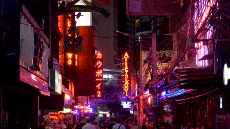 Wide-Shot-of-Neon-Signs-Red-light-district-in-Bangkok-Thailand