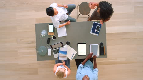 Business-people-meeting-high-five-for-brand