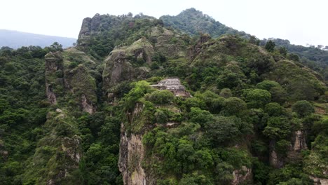 Dolly-out-shot-of-Tepoztlan's-pyramid-in-Morelos-Mexico