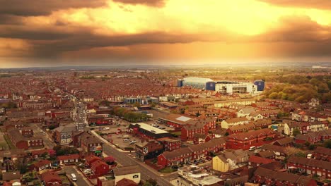 Everton-Football-Club,-Goodison-Park---Aerial-Rise-Up-Shot-At-Sunset