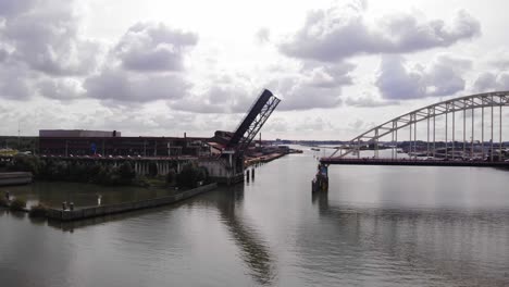 Aerial-View-Of-Opened-Bascule-Bridge-Over-Noord-River-Slowly-Closing