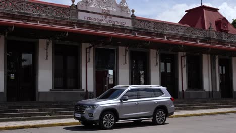 standard-suv-in-the-city-enter-at-railroad-station