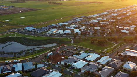 AERIAL-Sunrise-Over-New-House-Build-Construction-Site