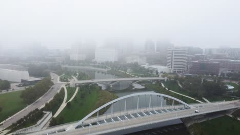 Columbus-Ohio-skyline-on-a-foggy-morning,-aerial-drone