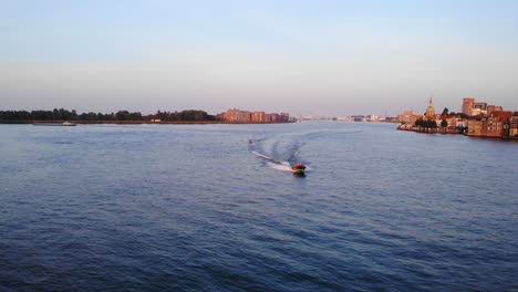 Speedboat-On-Oude-Maas,-Dordrecht.-Aerial-Tracking