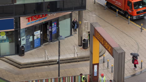 Time-Lapse-of-Local-Supermarket-with-People-Waiting-Outside-Premises