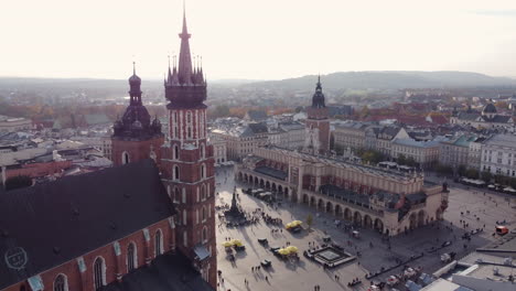 Aerial-Orbit,-Krakow-Medieval-Market-Square,-Golden-Hour-Sunset-View