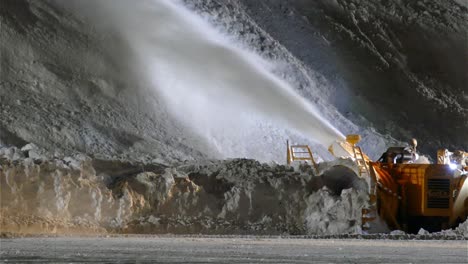 Turbine-snowplow-working-to-create-a-snow-quarry