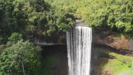 Tad-Tayicsua-Waterfall-in-Laos,-aerial-drone-slow-motion-view-of-popular-touristic-attraction-near-Bolaven-Plateau