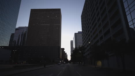 Truck-passes-through-empty-streets-of-Houston,-Texas-at-morning-time-during-COVID-19-lockdown