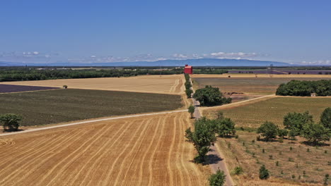 Sainte-Croix-du-Verdon-France-Aerial-v7-country-landscape-establishing-shot-drone-low-level-flyover-lavender-fields,-olive-groves,-truffle-plantation-and-cultivated-farmland---July-2021