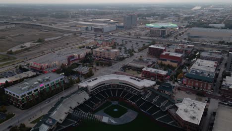Aerial-view-over-the-Chickasaw-Bricktown-ballpark-in-Oklahoma-city---reverse,-drone-shot