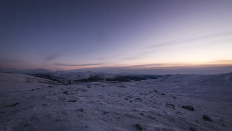 Beautiful-Sunrise-Over-Snowy-Landscape-In-Dovrefjell-Mountain-Range-In-Norway-At-Winter
