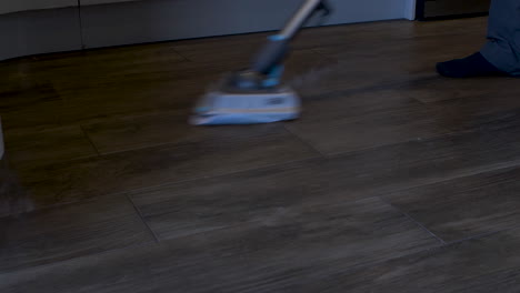 Steam-Cleaning-Mop-Being-Used-On-Wooden-Flooring