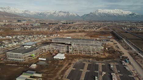 Construction-site-of-the-future-Primary-Children's-Hospital-in-Lehi,-Utah---orbiting-aerial-hyper-lapse