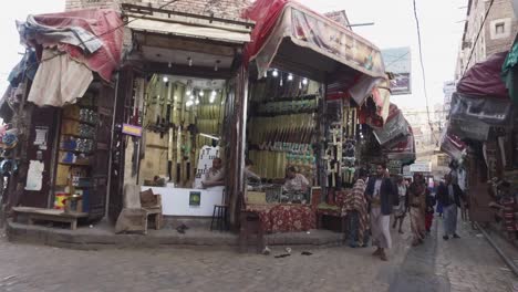 a-intersection-in-the-old-sana'a-city-with-copper-handcrafted-and-jambia-area-in-this-local-famous-marketplace