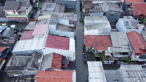 POV-from-top-aerial-shot,-flooded-street-in-residential-area