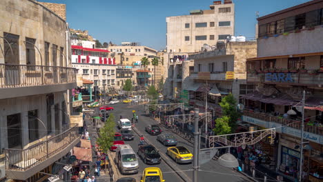 Timelapse,-Busy-Daily-Traffic-in-Amman,-Jordan,-Buildings,-People-and-Cars-on-Street-on-Sunny-Day