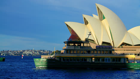 Ferry-Boat-Cruising-At-Port-Jackson-With-The-Famous-Sydney-Opera-House-In-The-Background-In-Sydney,-NSW,-Australia