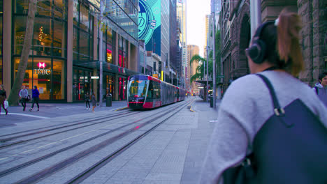 POV-From-A-Person-Walking-At-The-George-Street-With-Light-Rail-Tram-In-CBD-Of-Sydney,-Australia