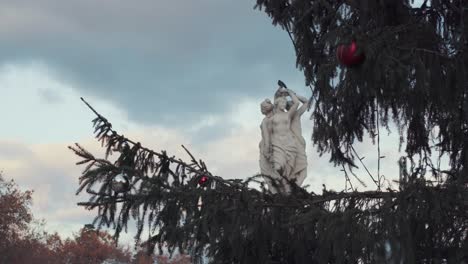Statue-at-Place-de-la-comedie,-Montpellier---France,-winter---Christmas-time