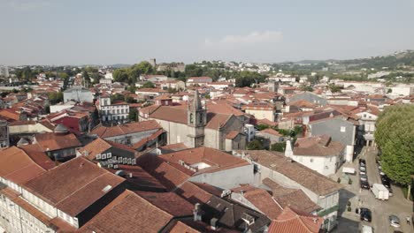 Aerial-reveals-tiled-red-roofs-of-medieval-buildings