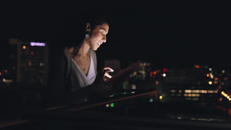 City-night,-tablet-and-business-woman-on-rooftop