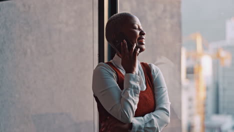 Phone-call,-communication-and-black-woman-laughing