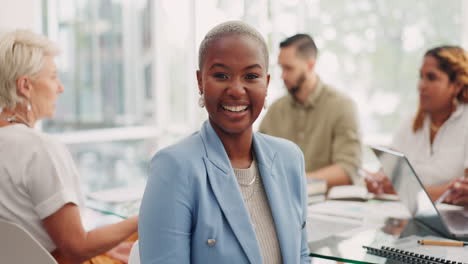 Face,-leadership-and-happy-black-woman-in-meeting