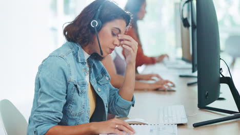 Stress,-headache-and-burnout-woman-at-call-center