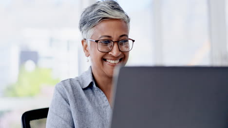 Happy-woman-on-business-laptop-for-good-news
