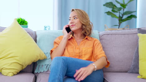 Answer,-relax-and-phone-call-with-woman-on-sofa