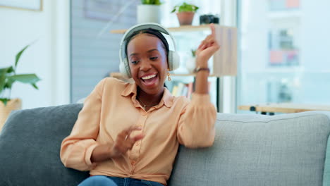 Black-woman,-headphones-or-dancing-on-home-sofa-to