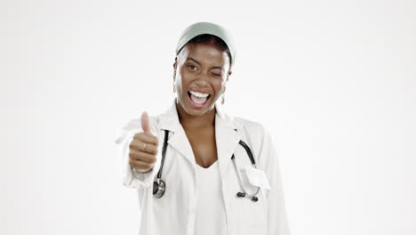 Black-woman,-doctor-and-thumbs-up-in-studio