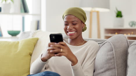 Phone,-laughing-and-happy-black-woman-on-sofa