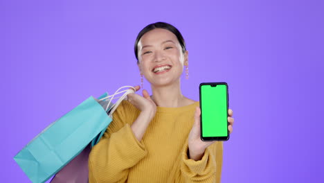 Asian-woman,-smartphone-and-green-screen-mockup