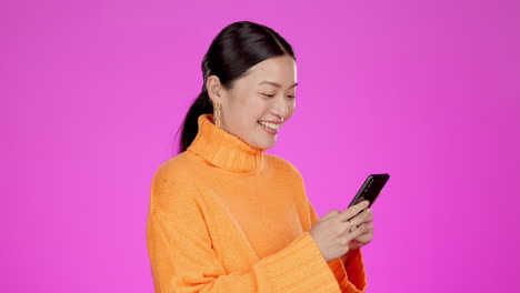 Laughing,-phone-typing-and-asian-woman-isolated
