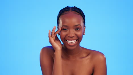 Skincare,-black-woman-and-hands-on-face-in-studio
