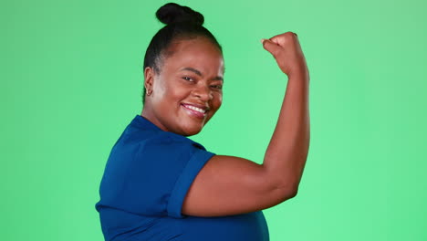 Happy,-flex-and-strong-with-black-woman-in-studio