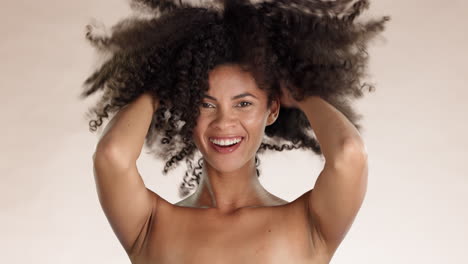 Beauty,-curly-hair-and-face-of-woman-in-studio