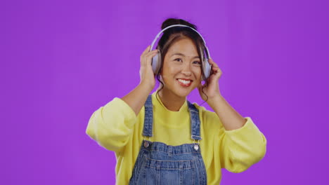 Music,-headphones-and-Asian-woman-face