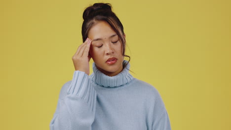 Young-asian-woman,-headache