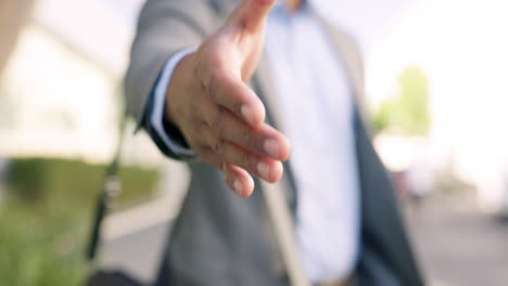 Closeup-hand,-handshake-and-businessman-in-a-city