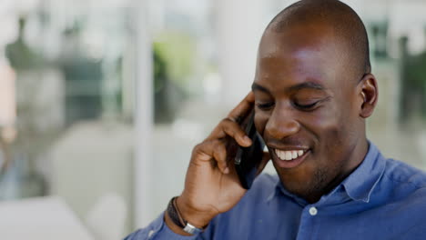 Black-man,-laughing-with-phone-call